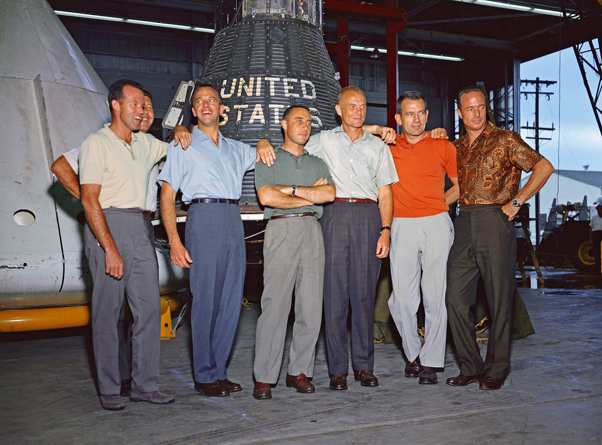 Group portrait of the Mercury Seven astronauts in flight suits, 1960.